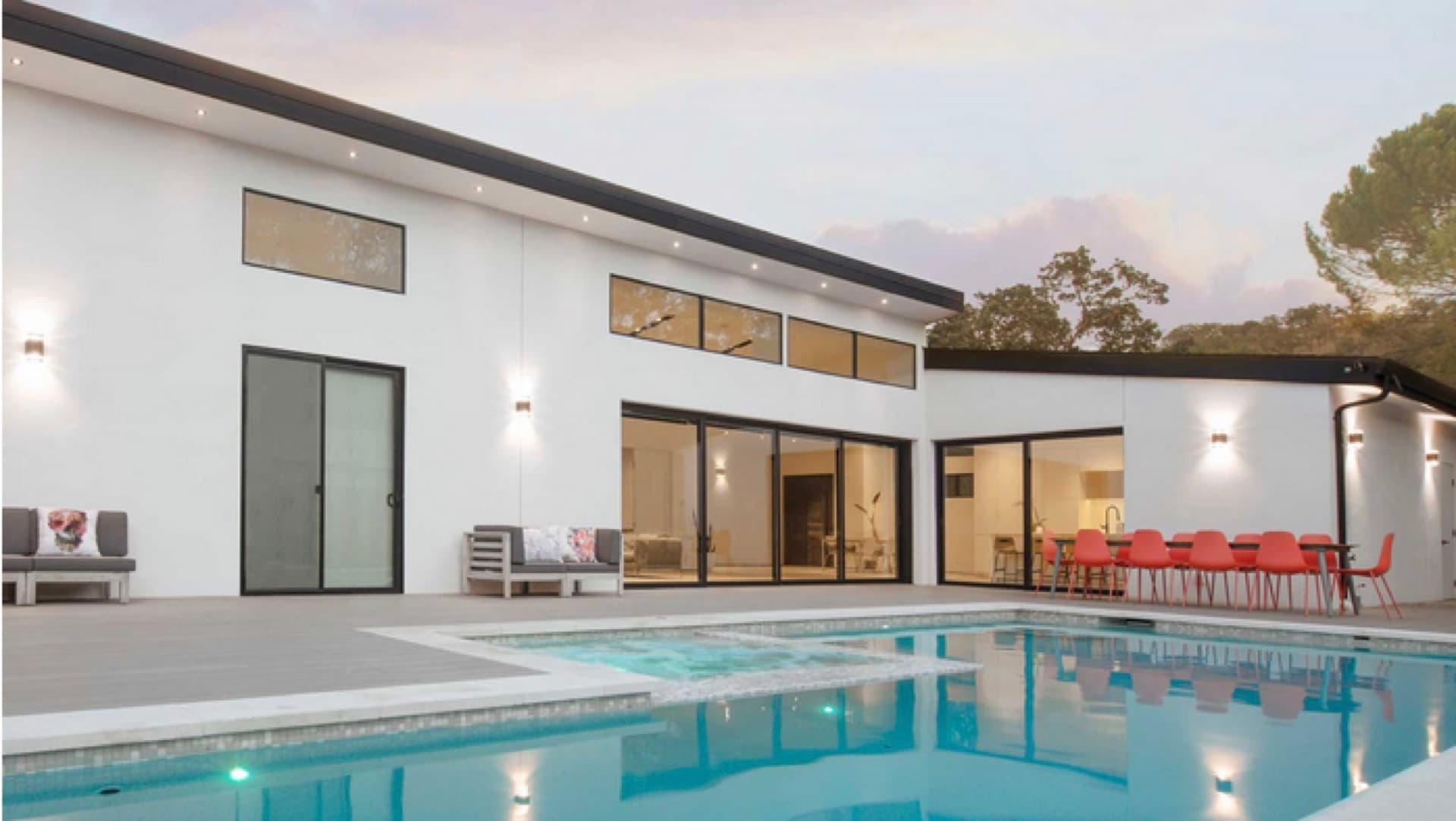 Exterior of a full custom 3,500-square-foot home in the Tice Valley area of Walnut Creek with a pool and covered patio